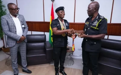 Grace Mintah Presents World Armwrestling Gold Medal to IGP Dampare